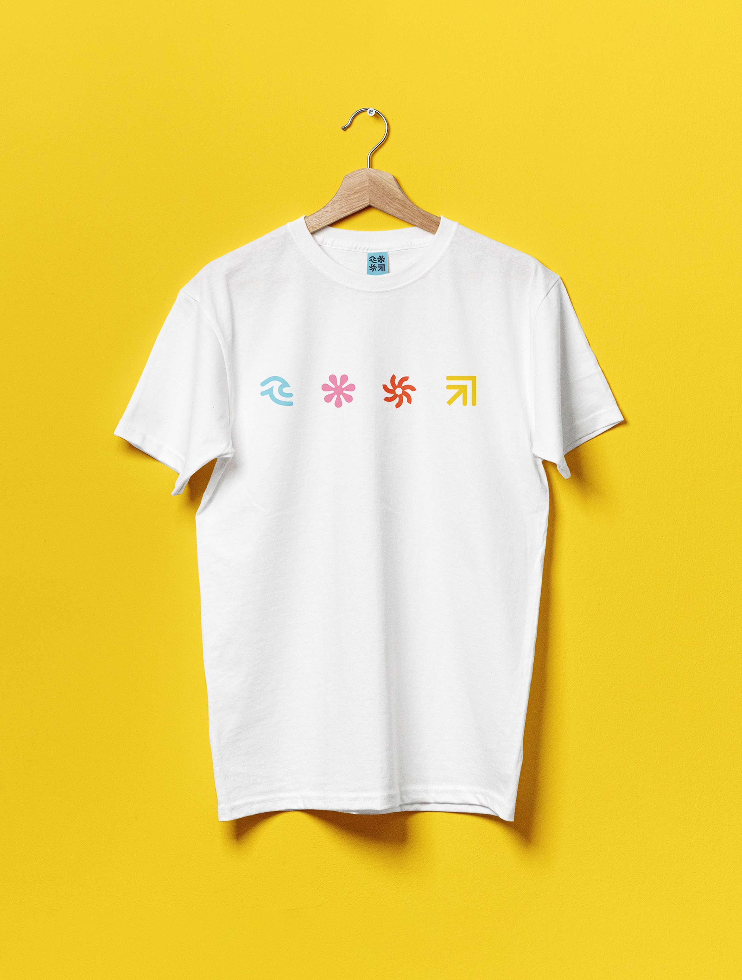 white t shirt with coloured icons